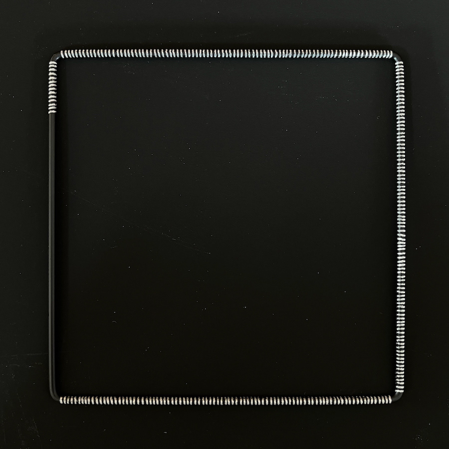 281 lines, 11th May, silver fineliner on a metal square ring