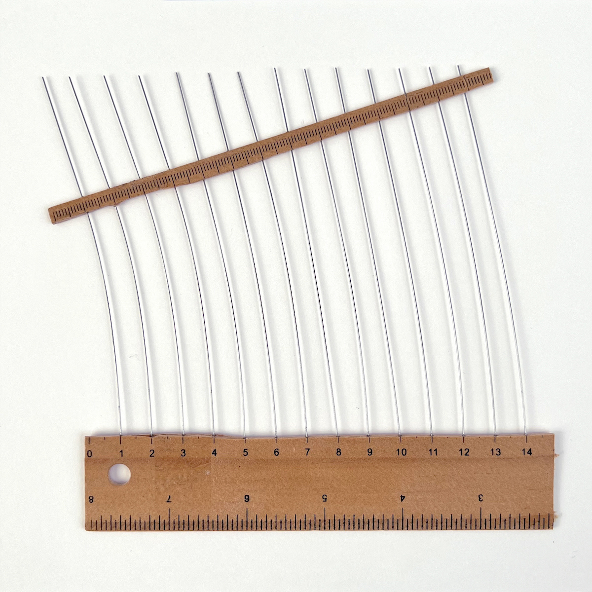 14 lines, 18th August, broken ruler and metal wire
