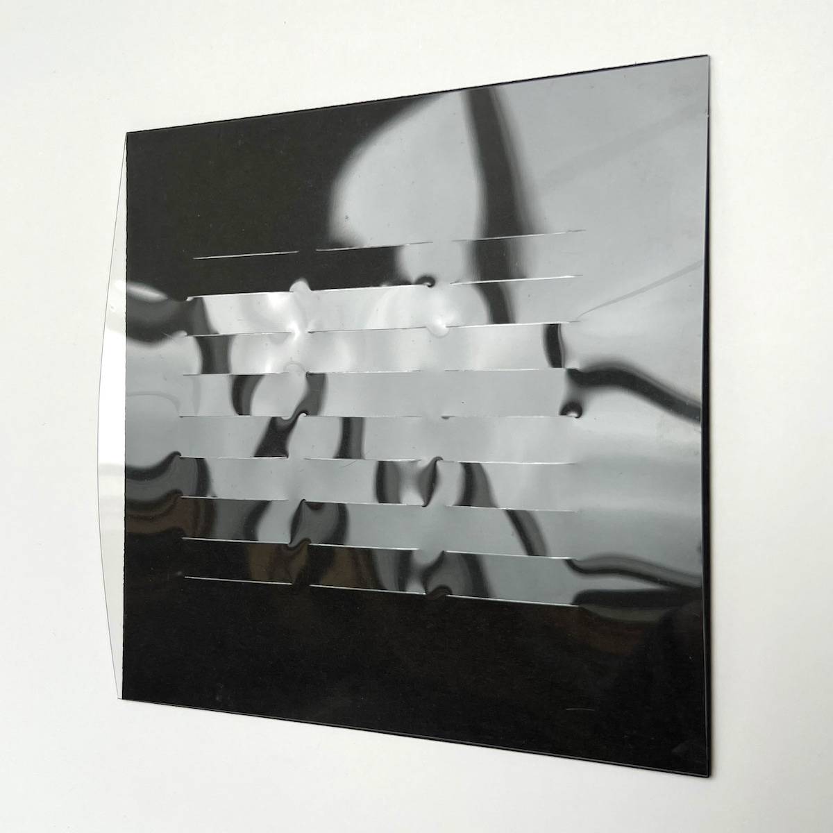 27 lines, 31st August, cuts in plastic sheet on black paper