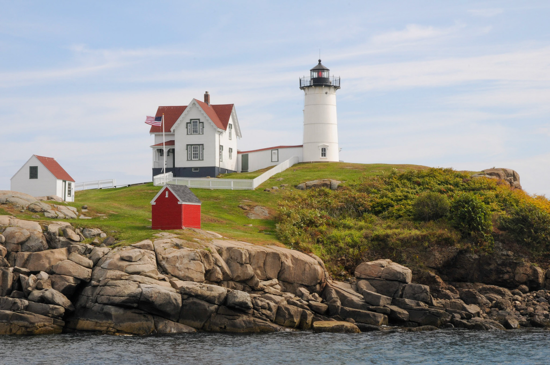 The Nubble Lighthouse sits on top of the Cape Neddick Nubble, which is a very small rocky island. It is one of the most photographed lighthouses in the country and is visited by thousands of people each year.