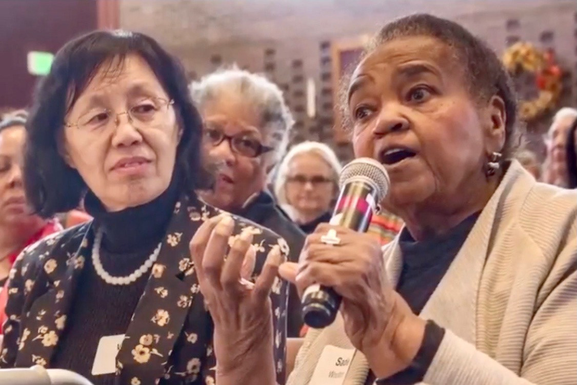 Rev. Woolford advocating for equality in press coverage at a community meeting sponsored by Horizon Foundation in 2018.