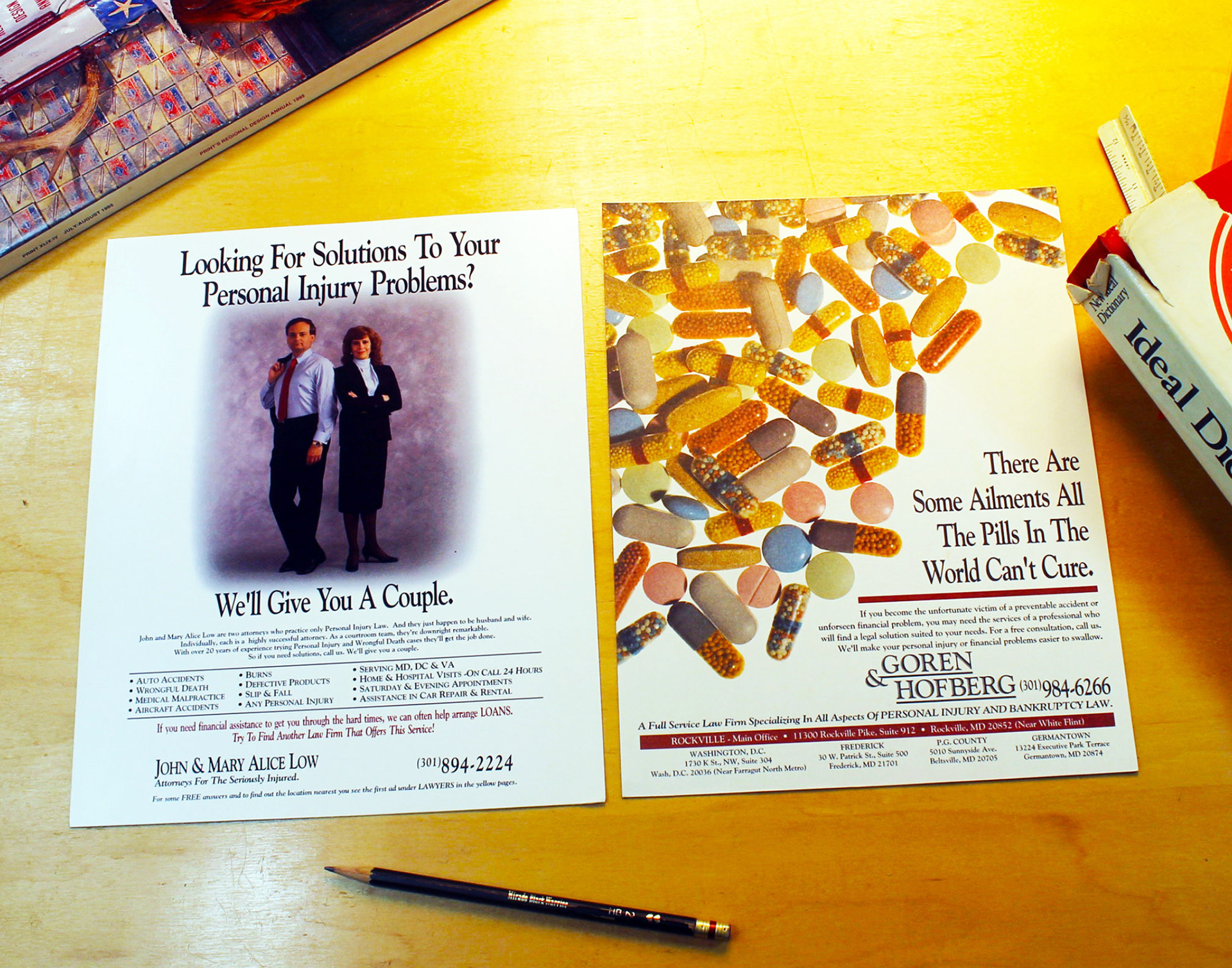 Ads for personal injury attorneys from the back and inside covers of the Yellow Pages. Remember phonebooks?