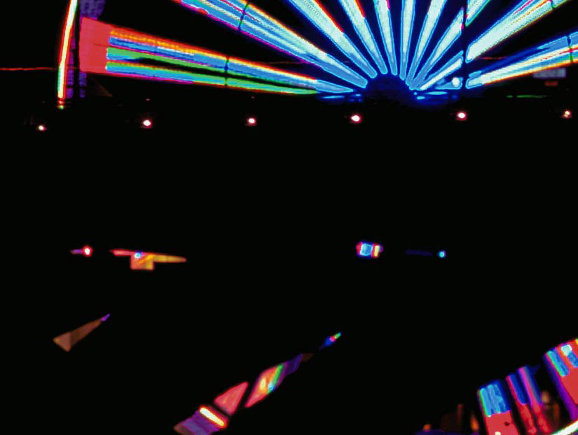 Enlarged view revealing color detail of Ferris wheel