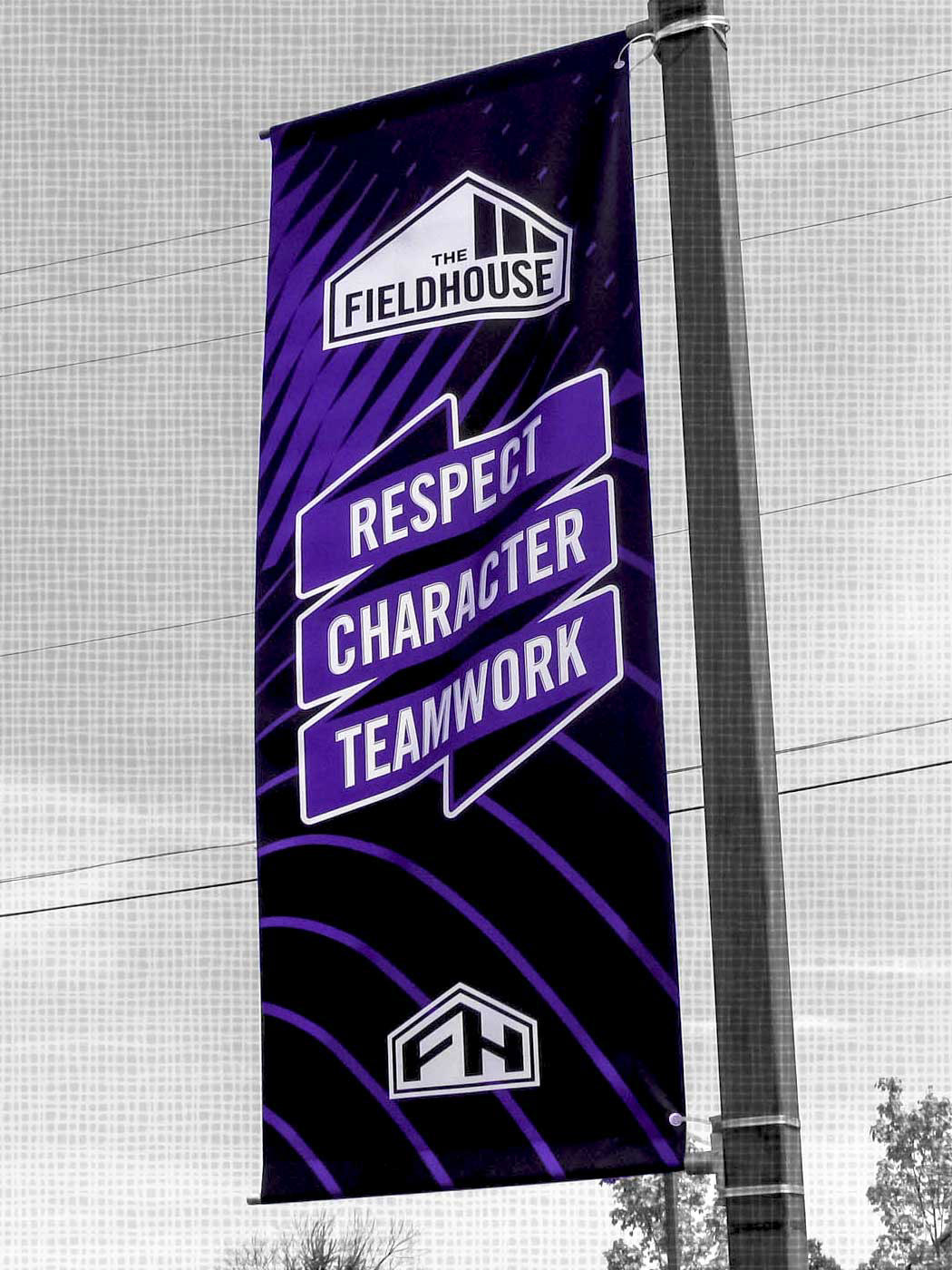 Outdoor photo of vertical display banner for sports facility entrance