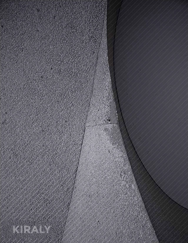 Architectural photo of concrete surfaces coming together to form interesting shapes entitled Space