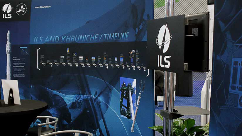 Another photo of rocket launch management company booth in exhibit space