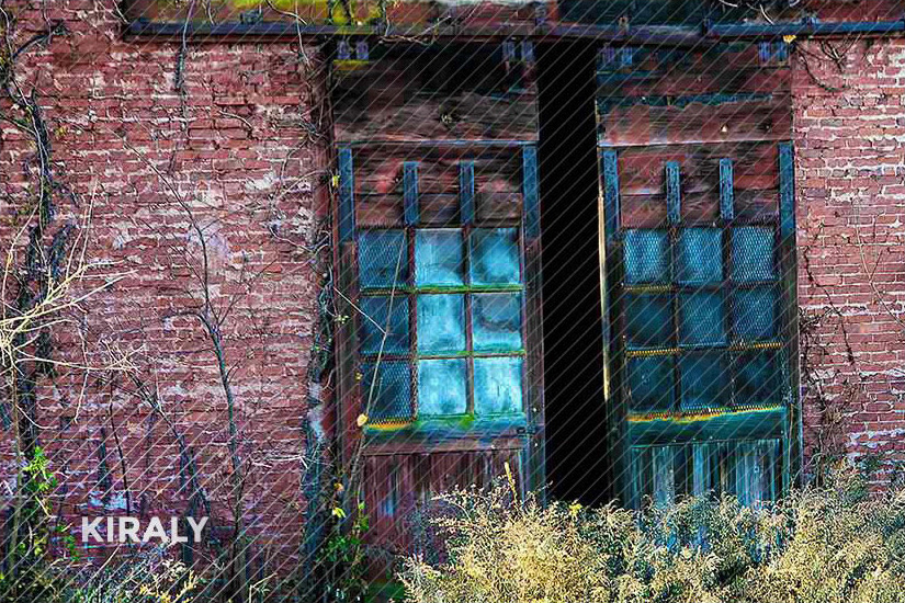 Photo of colorful barn-style doors slightly ajar