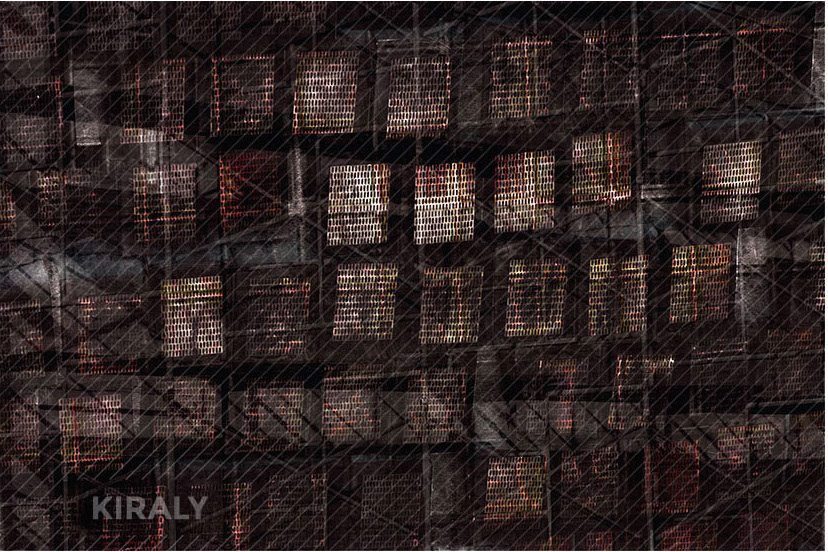 Photo of stacked wood blocks capped with metallic grated surfaces