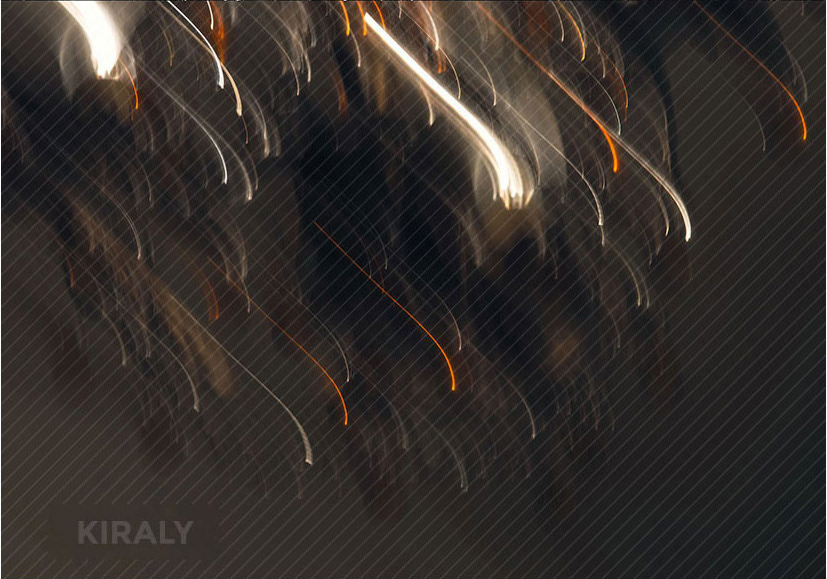 Slow shutter speed photo of a hanging, crystal light