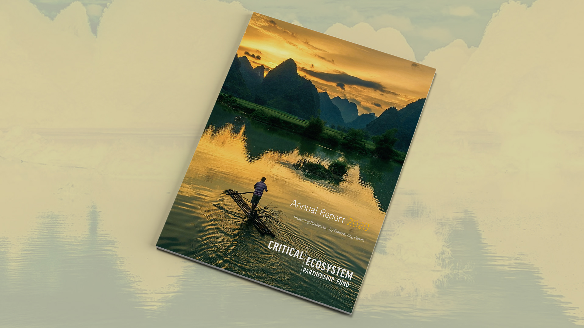 Cover featuring a person on a bamboo style raft paddling slowly toward a jagged mountain landscape with a golden sunrise