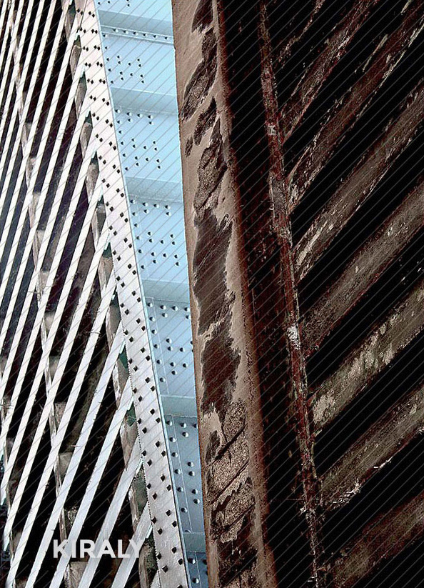 Architectural metal structure where one side appears opposite in age of the other