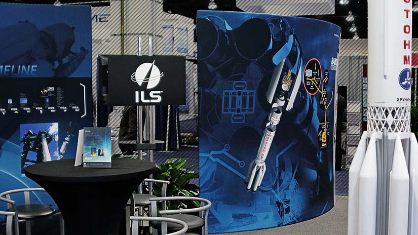 Another photo of rocket launch management company booth in exhibit space