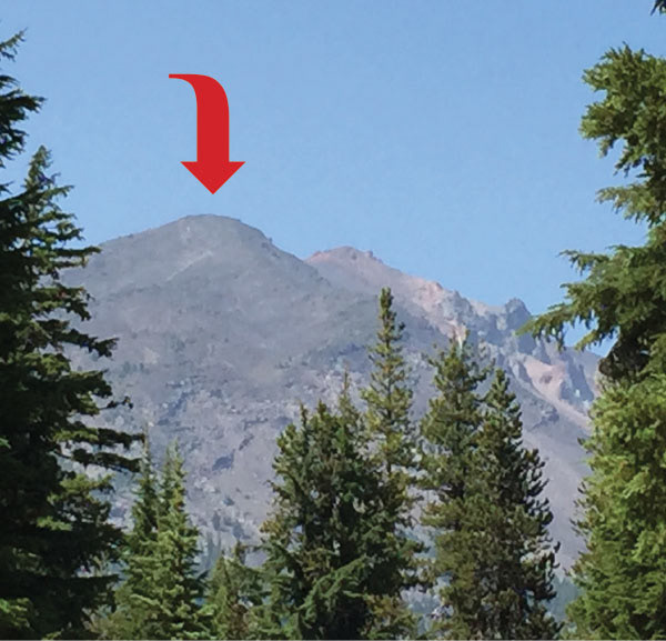Here’s me at what turned out to be the false summit, viewing the real summit in the distance and crying Uncle. It looks alot closer than it actually was.
