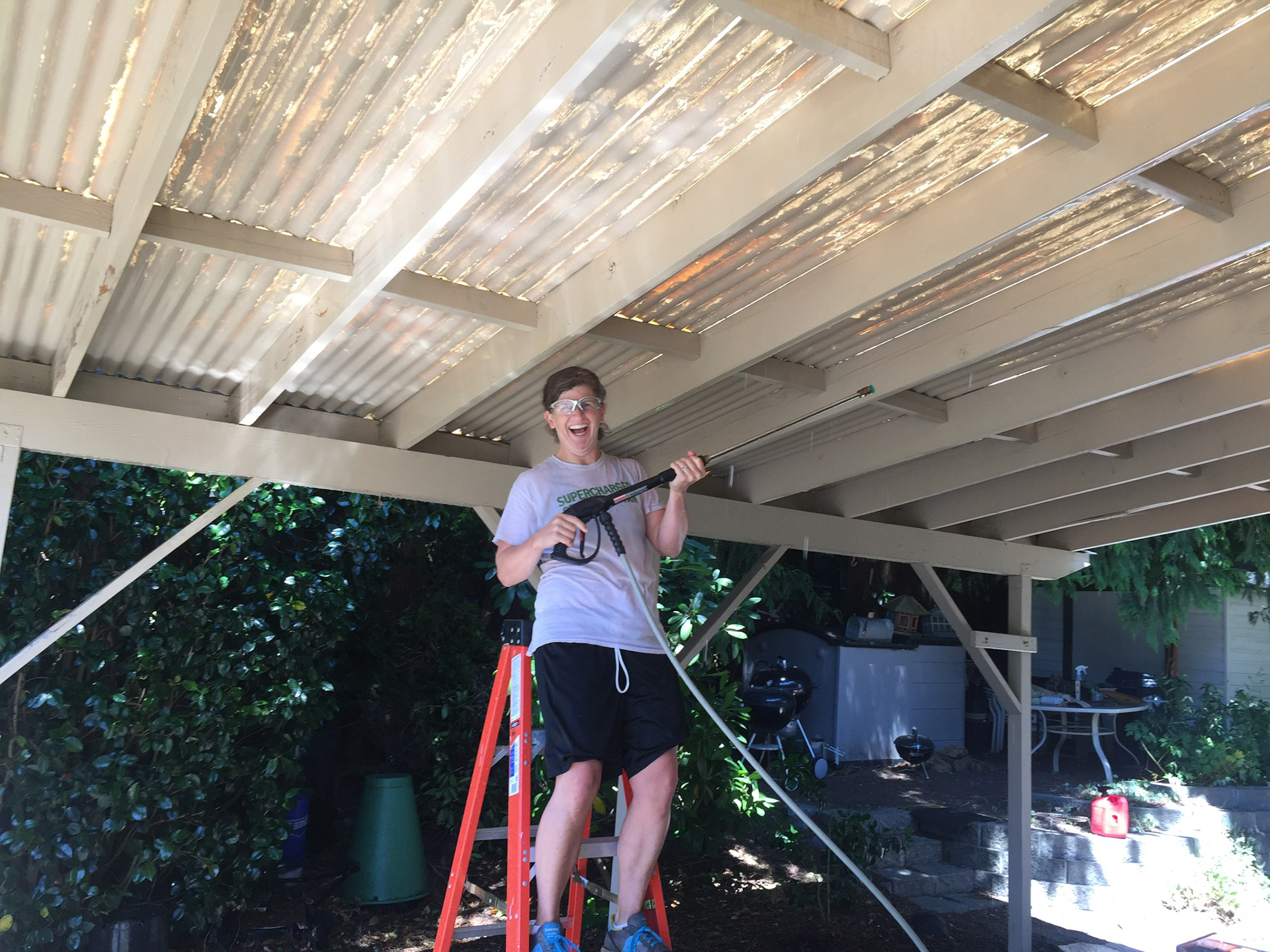 Waving fun with the pressure washer.