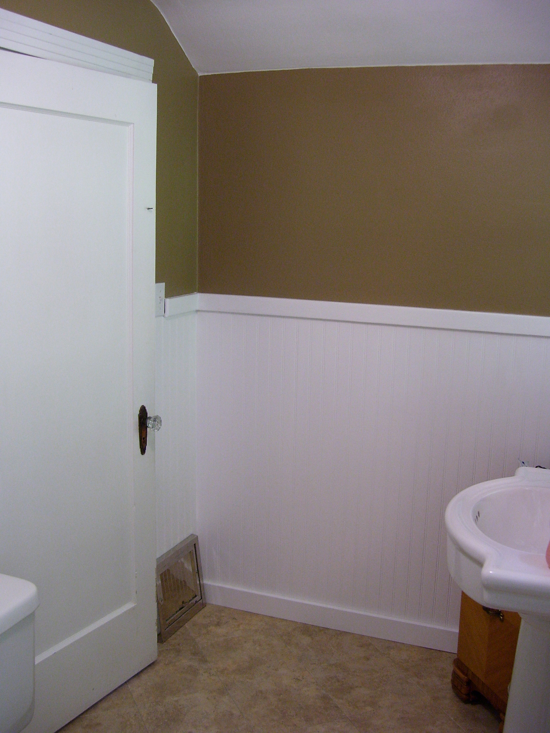 New wainscoting panels and paint.
