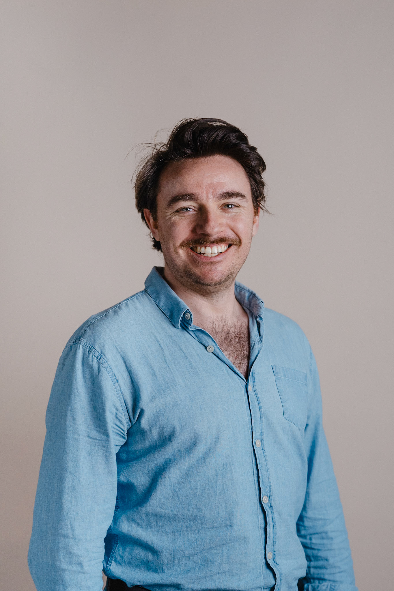 Studio headshot taken during a Staff headshots session