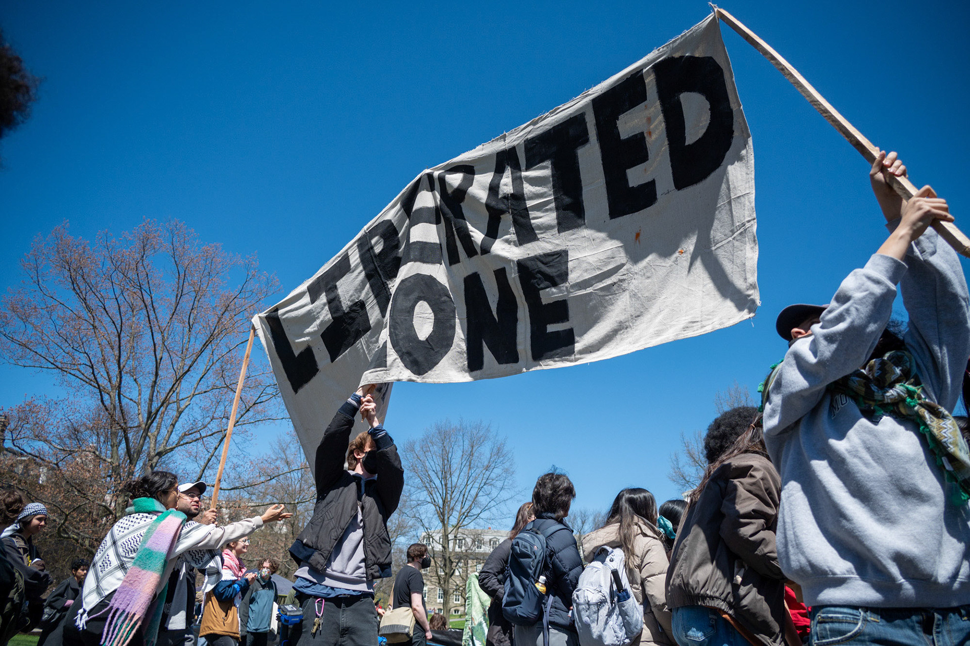 A banner that says "Liberated Zone" at the CML Encampment on the Arts Quad, April 25th, 2024. (Ming DeMers/Senior Photo)