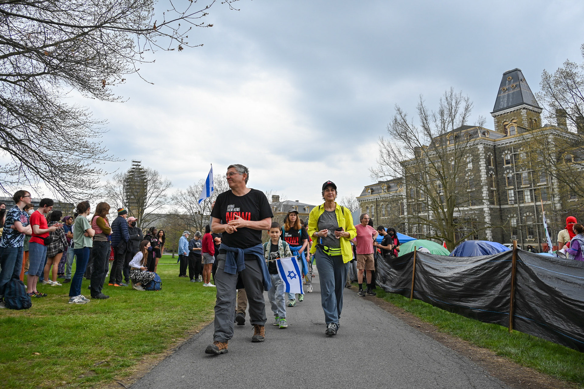 Run for Their Lives counter protestors walk through a CML Rally at t the Liberated Zone Encampment on the Arts Quad, April 28th, 2024. (Ming DeMers/Sun Senior Photo)