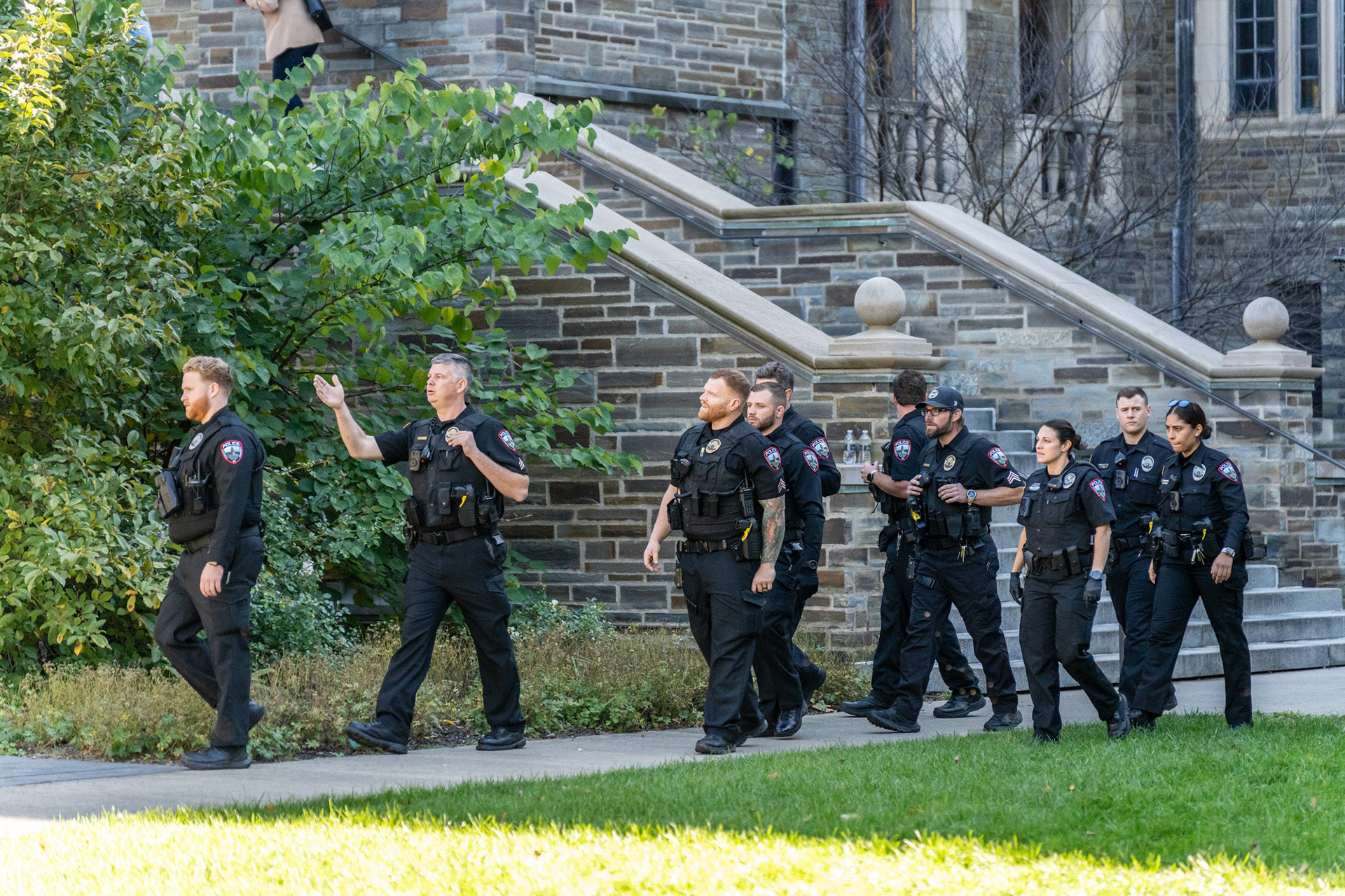 CUPD Officers walk to the CML Rally Walkout of the Board of Trustees Meeting at the Law School, Myron Taylor Hall Courtyard, Oct 18, 2024. (Ming DeMers/Sun Photography Editor)