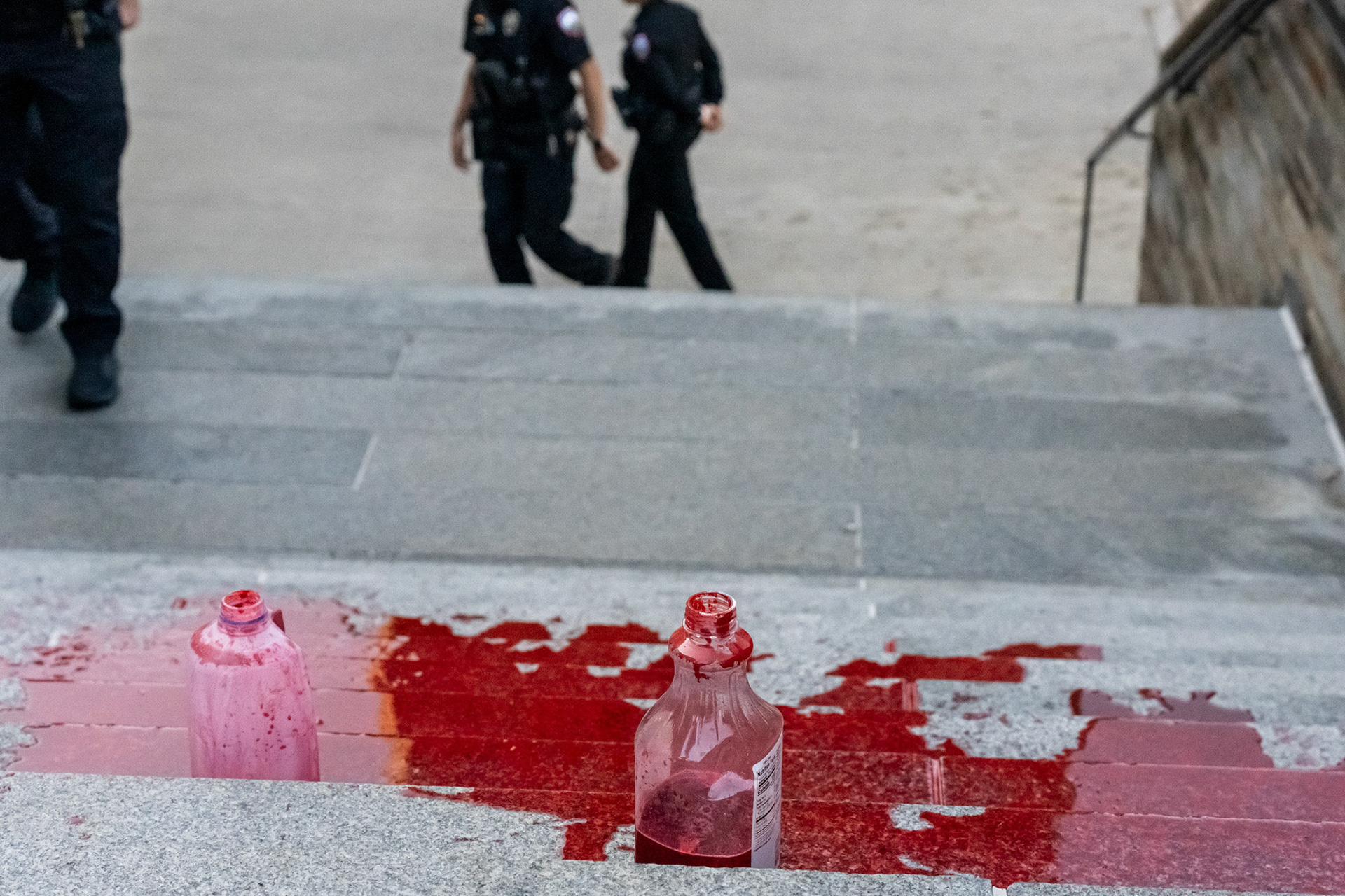 Fake blood is left on the stairs at the CML Rally Walkout of the Board of Trustees Meeting at the Law School, Myron Taylor Hall Courtyard, Oct 18, 2024. (Ming DeMers/Sun Photography Editor)