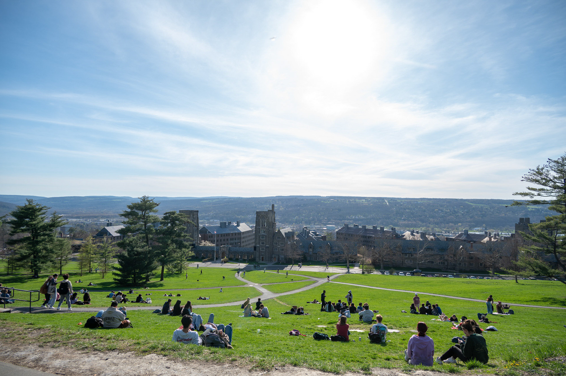 Students enjoy the sunny weather on Libe Slope,  April 16th, 2024. (Ming DeMers/Sun Senior Photo)