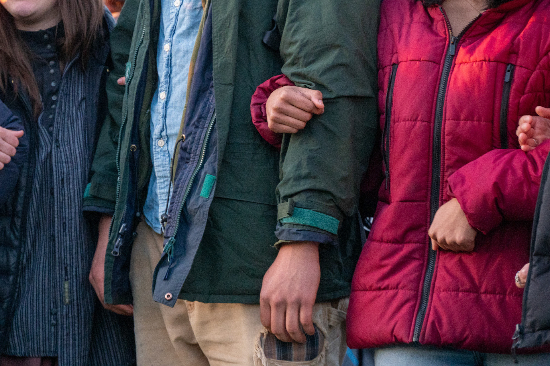 Protestors link arms around the CML Encampment on the Arts Quad, April 25th, 2024. (Ming DeMers/Senior Photo)