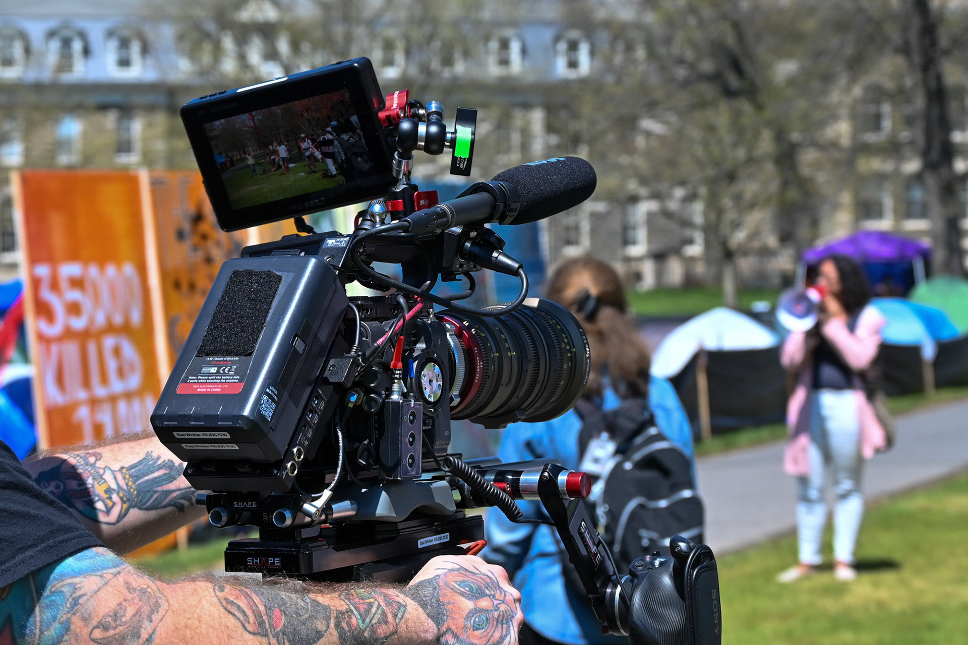 Documentary crews record the Law School rally, in support of the CML Liberated Zone Encampment, Arts Quad, May 1, 2024. (Ming DeMers/Sun Senior Photographer)