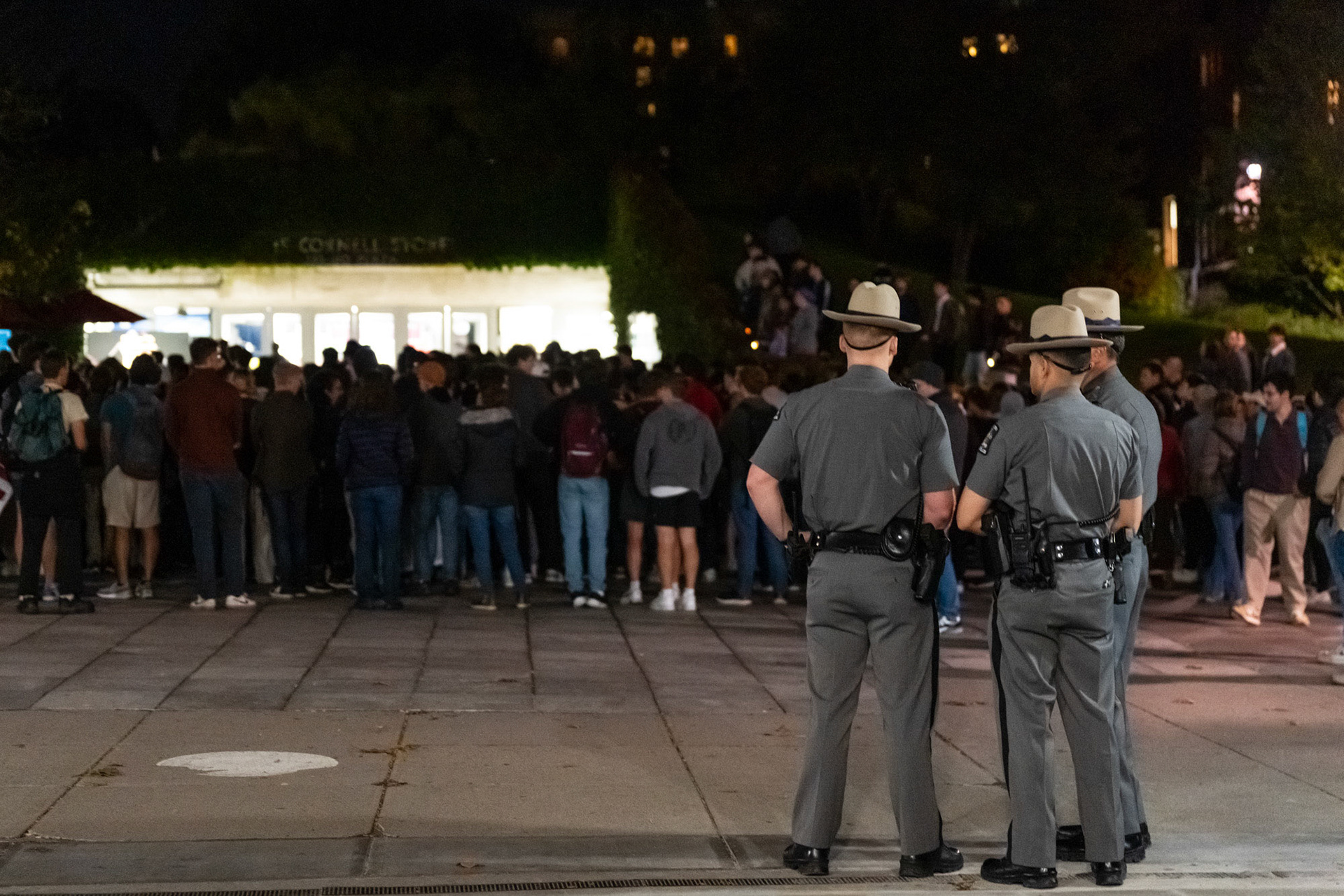 New York State Police officers, along with CUPD and IPD were on stanby at the Hillel Vigil for Israel, Ho Plaza, Oct 7, 2024. (Ming DeMers/Sun Photography Editor)
