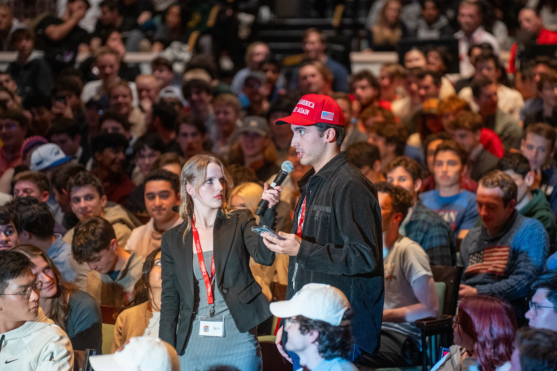 Quinn Reinhardt ’25, who identified himself as a gay republican voting for Donald Trump, said that many in the LGBTQ+ community feel that liberal media produces a climate of fear regarding former president Trump and the Republican party, at the Ben Shapiro Talk, Bailey Hall, Oct 28, 2024. (Ming DeMers/Sun Photography Editor)