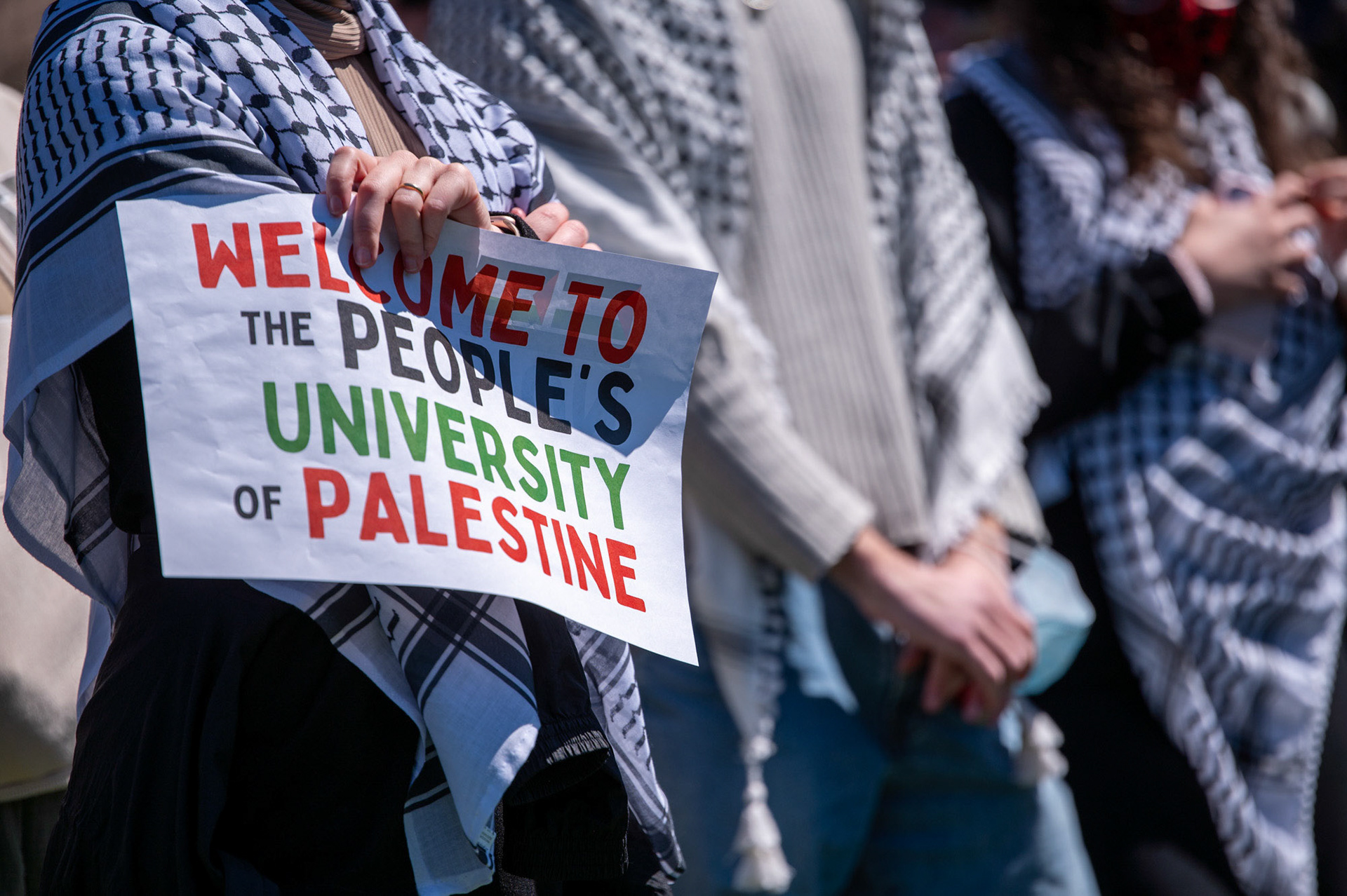 A sign at the CML Encampment on the Arts Quad, April 25th, 2024. (Ming DeMers/Senior Photo)
