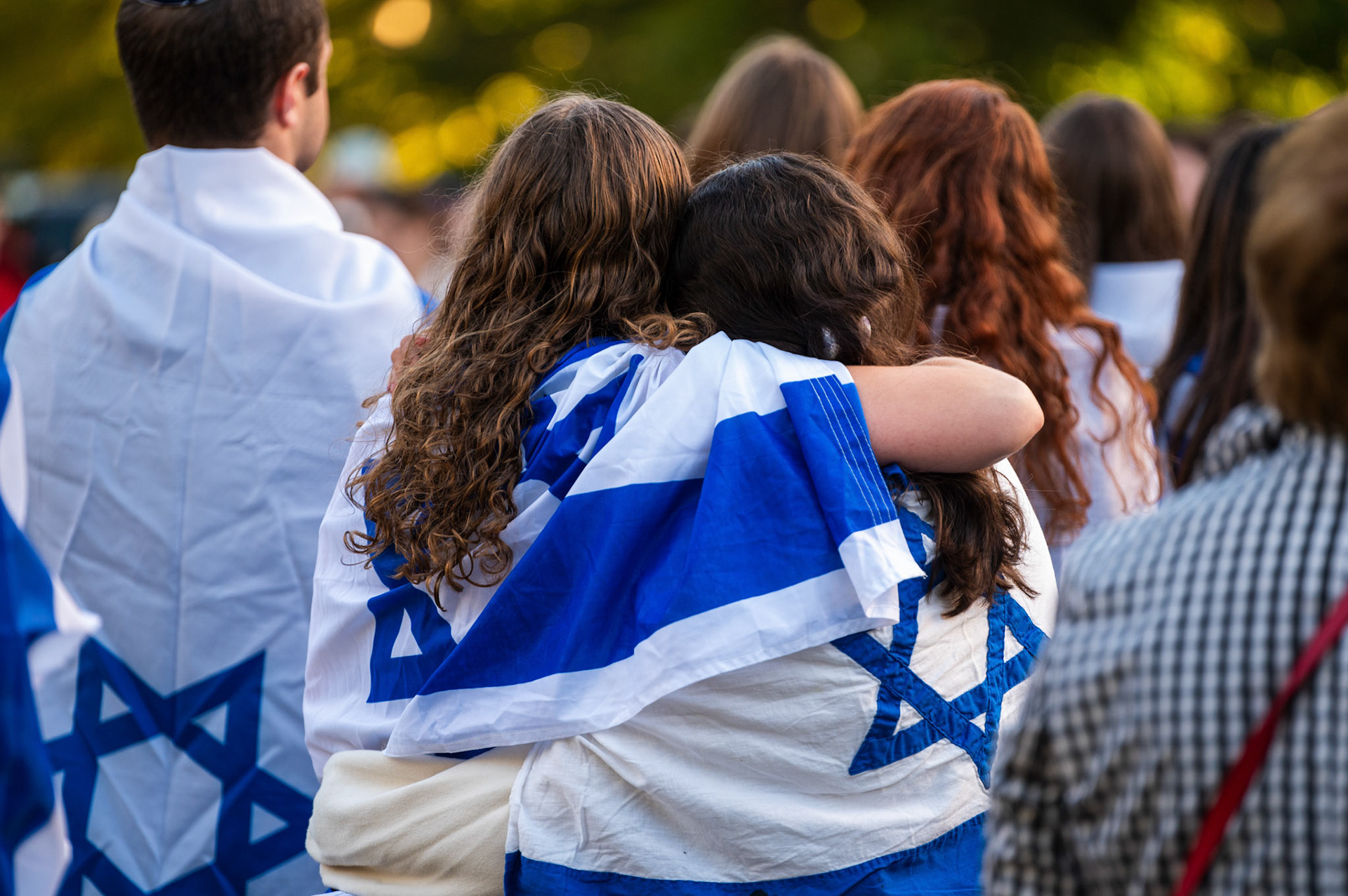 Two attendants hug at the Cornellians for Israel's vigil at Ho Plaza on September 2nd, 2024. (Ming DeMers/Sun Photography Editor)
