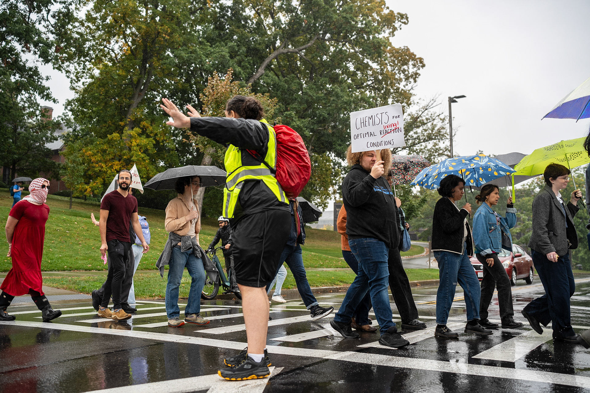 The CGSU Just Cause rally walks across Feeney Way to Day Hall from Bailey Hall, Oct 2, 2024. (Ming DeMers/Sun Photography Editor)