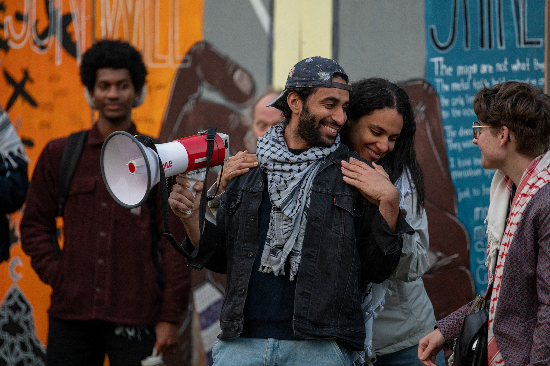 A speaker at a candlelight vigil for the last day of the CML Liberated Zone Encampment, Arts Quad, May 13, 2024. (Ming DeMers/Sun Senior Photographer)