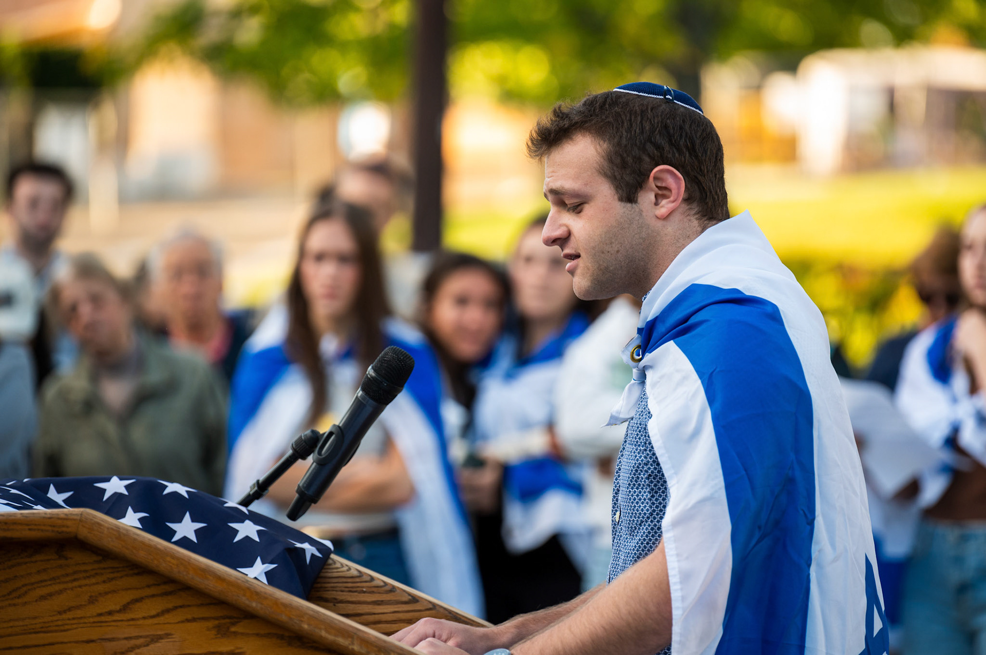 A speaker at the Cornellians for Israel's vigil at Ho Plaza on September 2nd, 2024. (Ming DeMers/Sun Photography Editor)