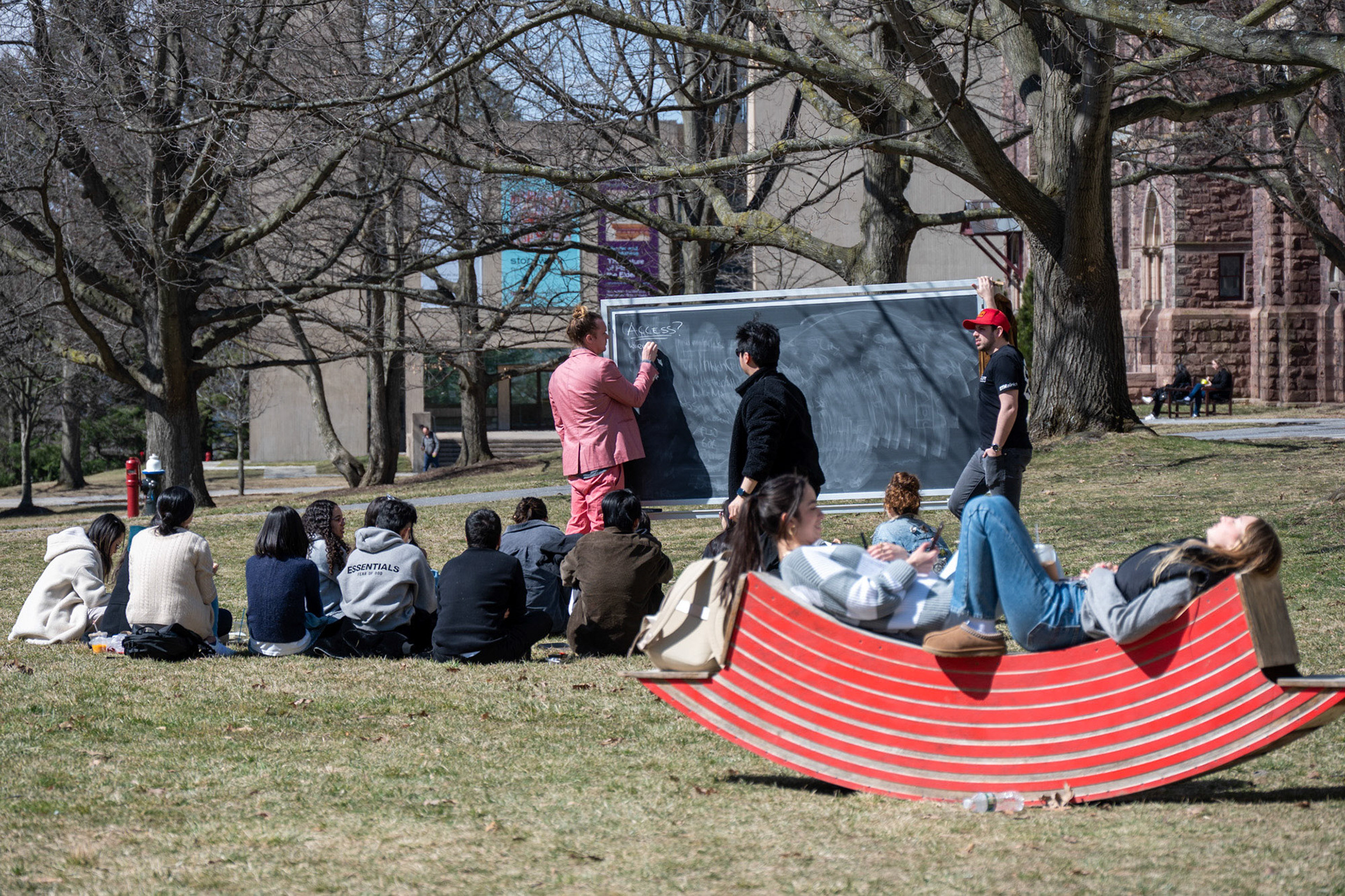 A class is held outdoors on the Arts Quad on Mar 23, 2023. (Ming DeMers/Sun Asst Photo)