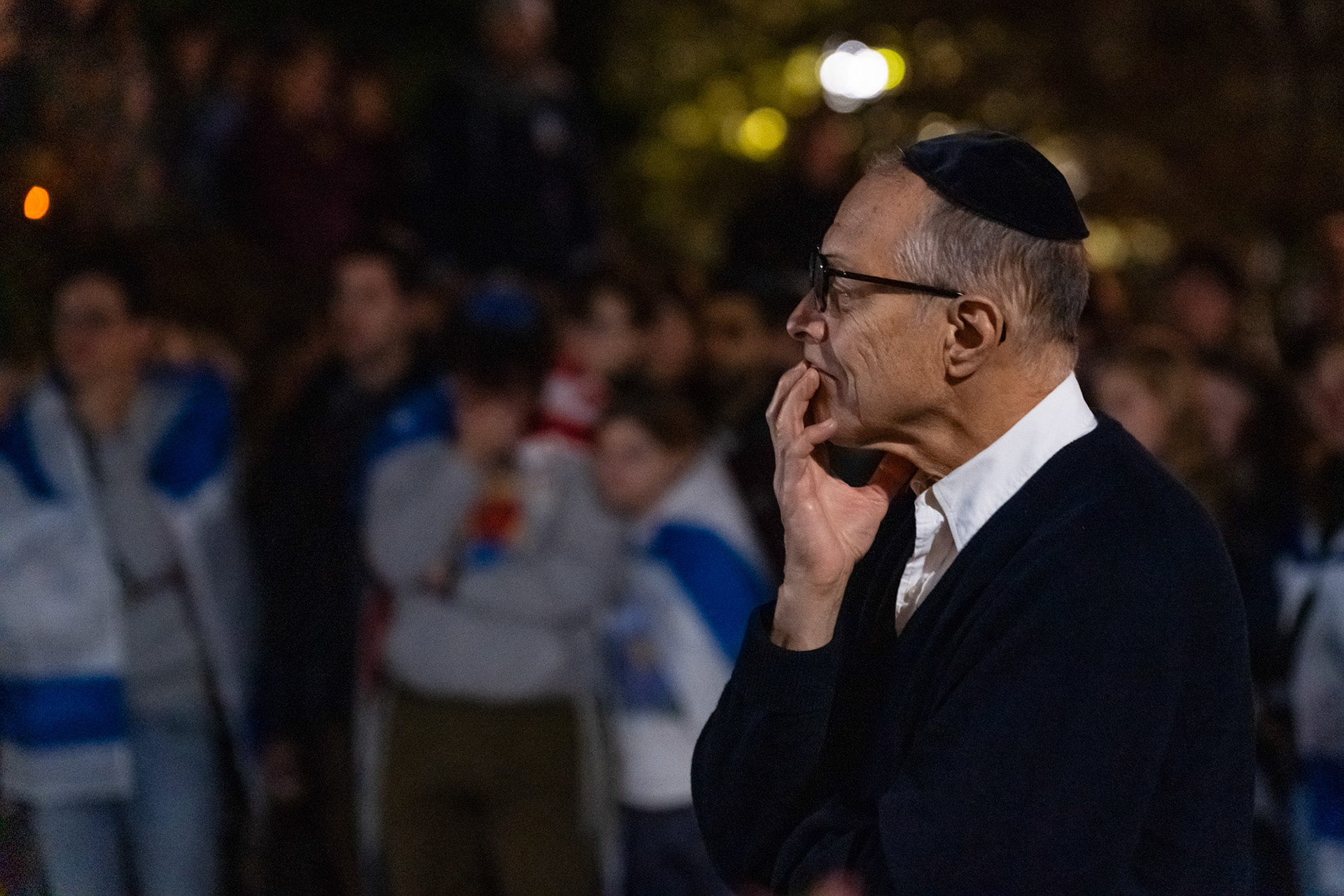 Attendees are moved to emotion after listening to the speech of a mother of a kidnapped hostage, at the Hillel Vigil for Israel, Ho Plaza, Oct 7, 2024. (Ming DeMers/Sun Photography Editor)