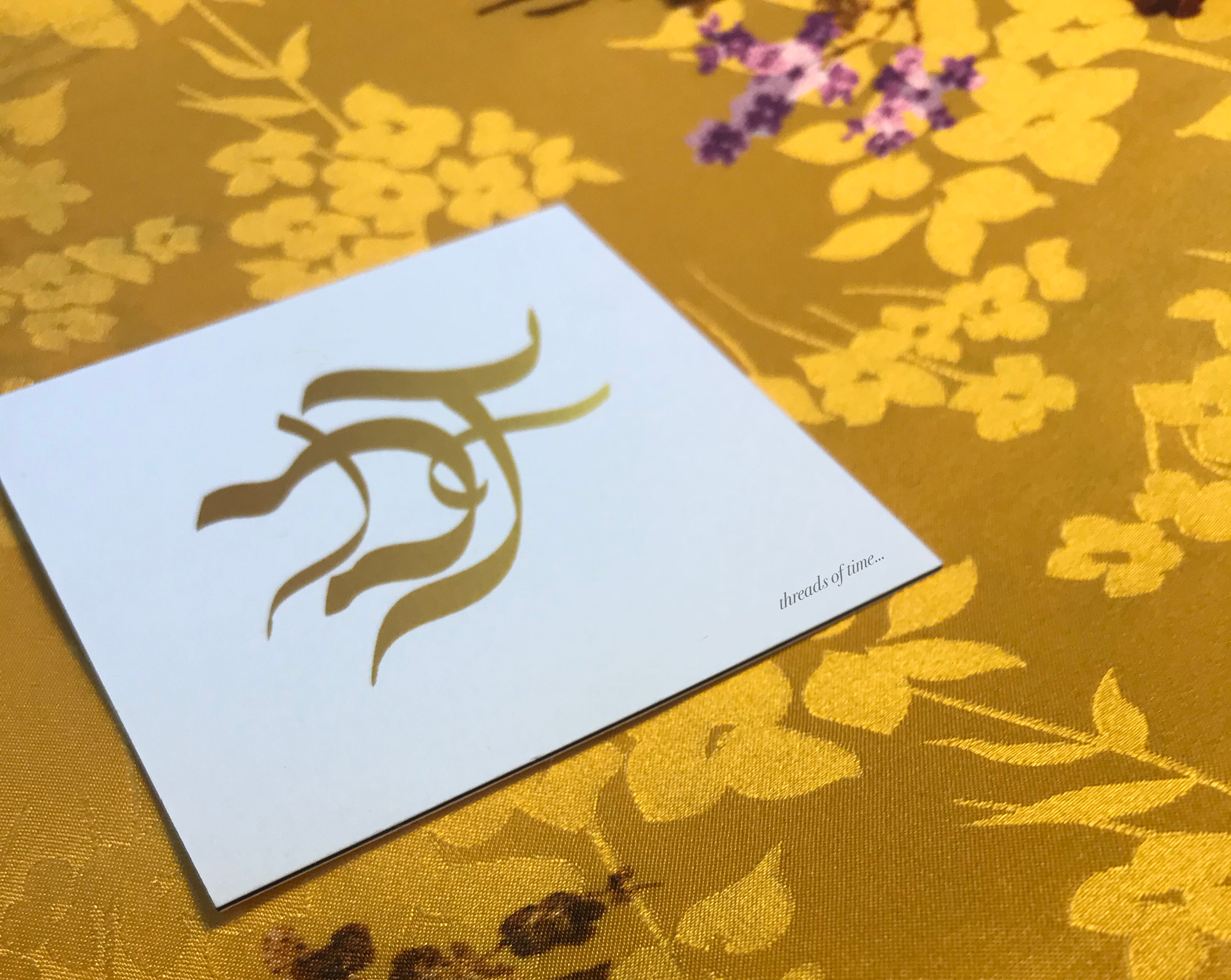 The logo design for a London-based fashion designer, featuring flowing elements that represent the lightness and elegance of fabric in motion.