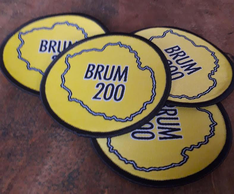 The original yellow version of the BRUM 200, 20219, embroidered patches, given to participants who completed the event in a different year.