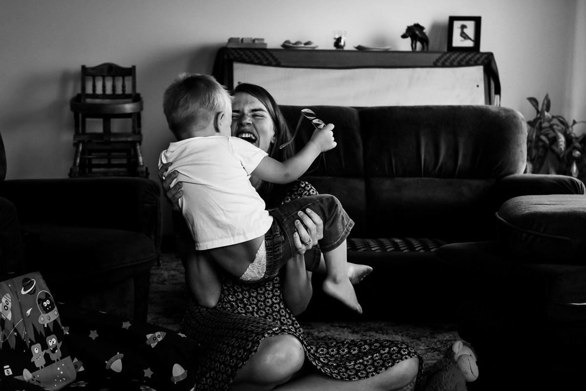 Mother and son laughing