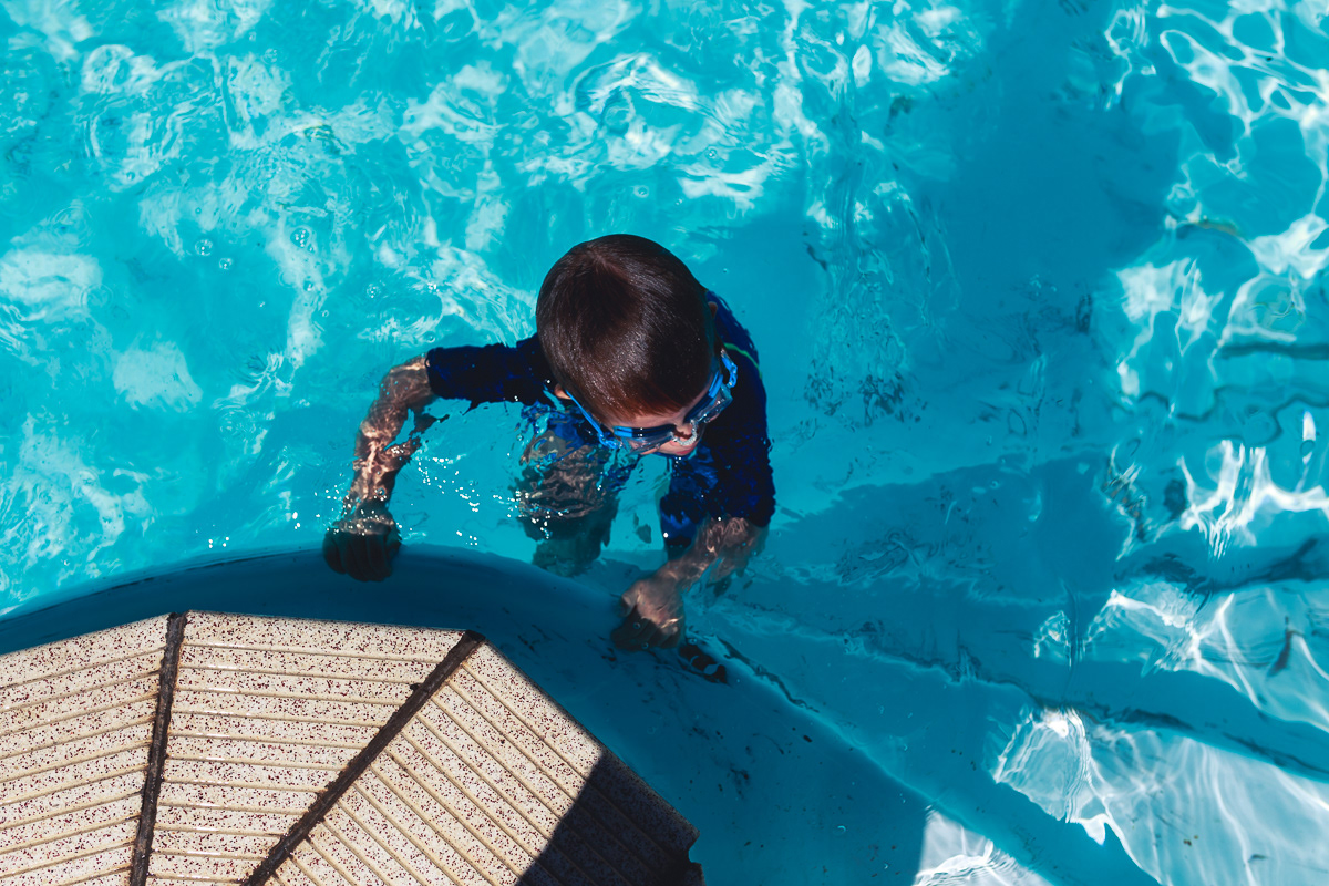 Boy in swimming pool