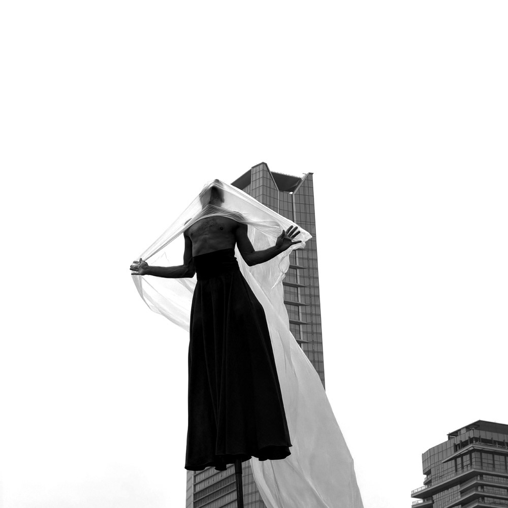Skyscraper 摩天大楼 - Captured near noon on 2 November 2025, this piece marks the soft opening of Shenzhen Bay Culture Square, featuring a performance by France’s Gratte Ciel. Held forever in memory, every element struck a quiet chord—the performer’s identity, raw emotion, and towering setting. Physical movement, skyscrapers, personal identity, struggle, letting go, relief, passion... It converged into a singular instant, deeply complex yet refined to its purest essence.