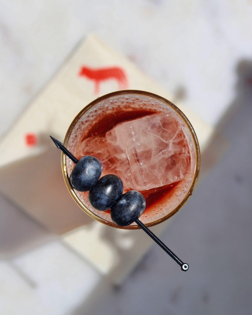 "Mezzanotte"; a Spritz with Cocchi Americano, Blueberry Hibiscus, Tea, and Prosecco