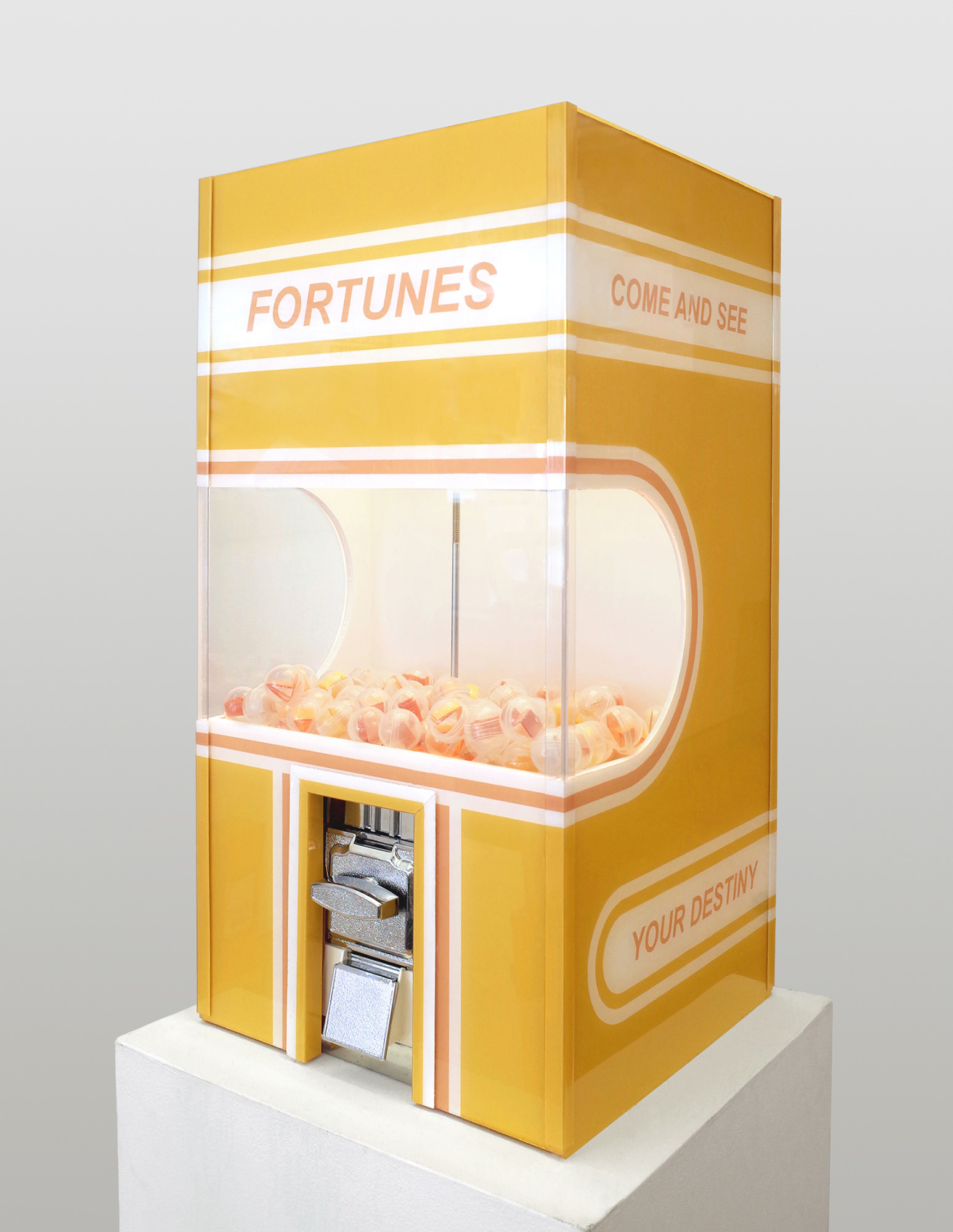 Painted yellow fortune-dispensing machine