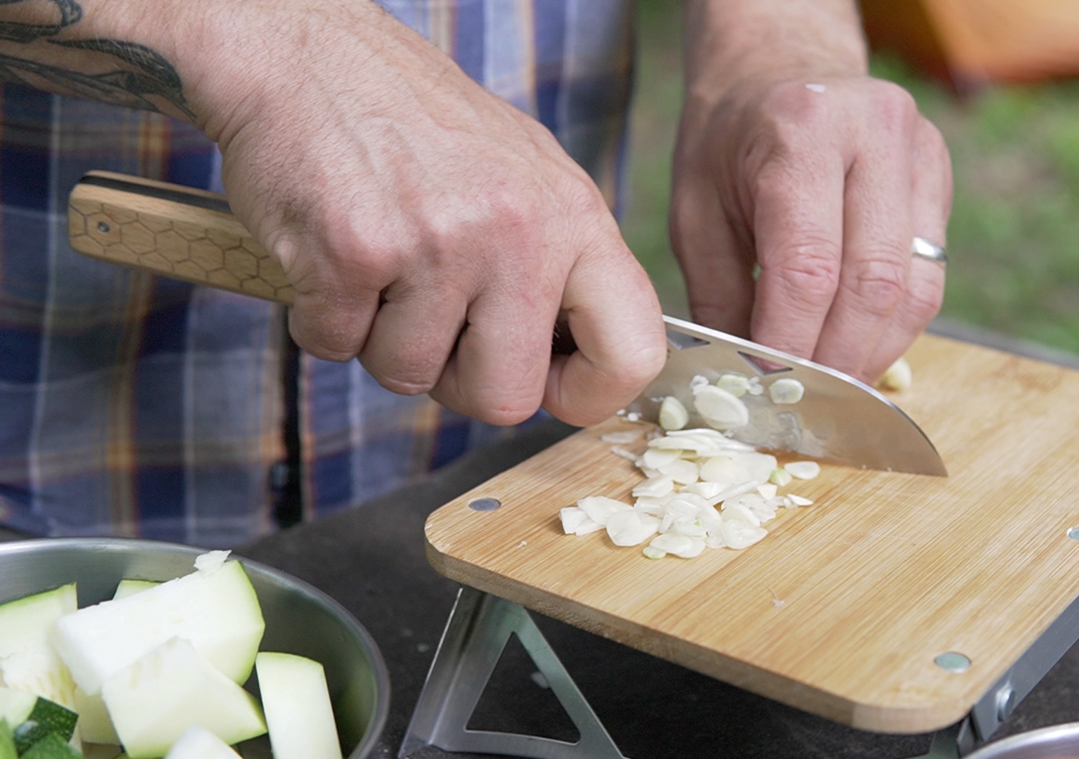 Chef Ben Bebenroth using the nCamp Food Prep Knife
