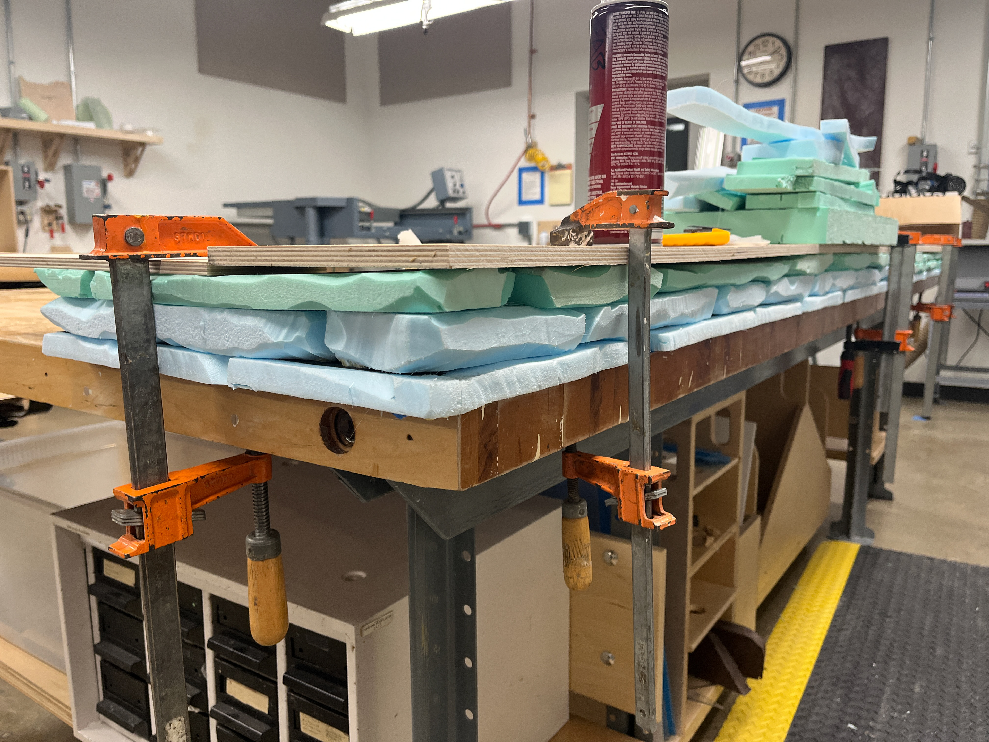 Carved foam stones being glued up.