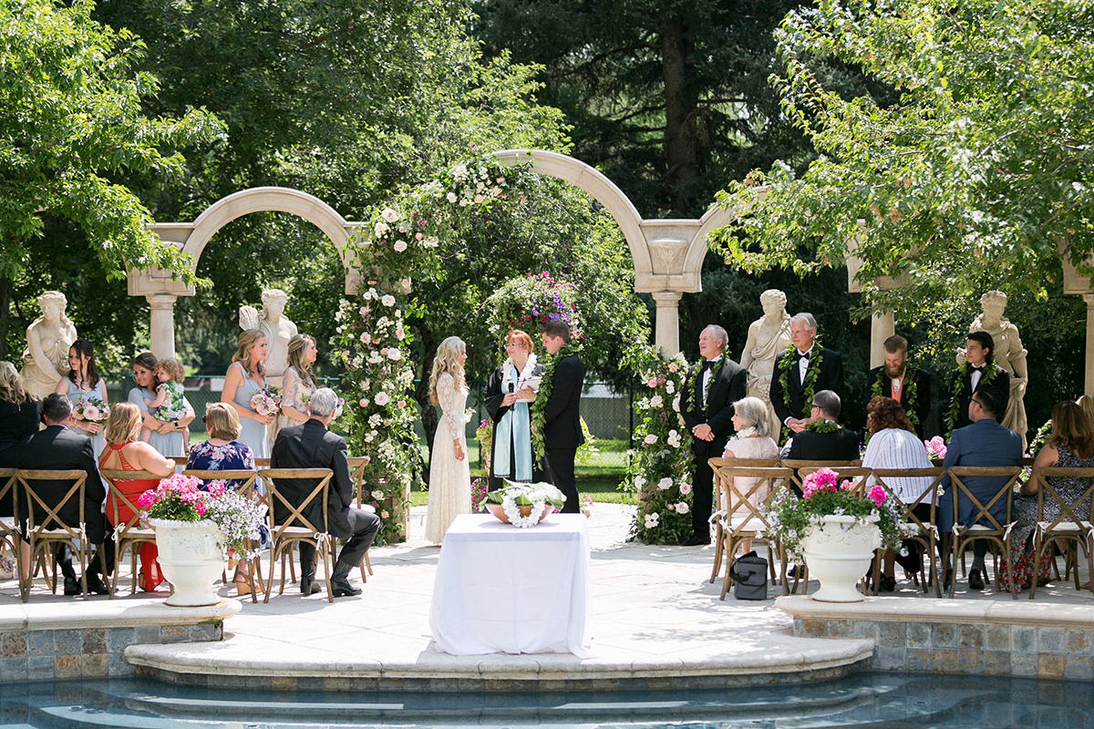 Rev. Kim Tavendale officiating at a ceremony held in the beautiful garden of a private residence in Denver, CO