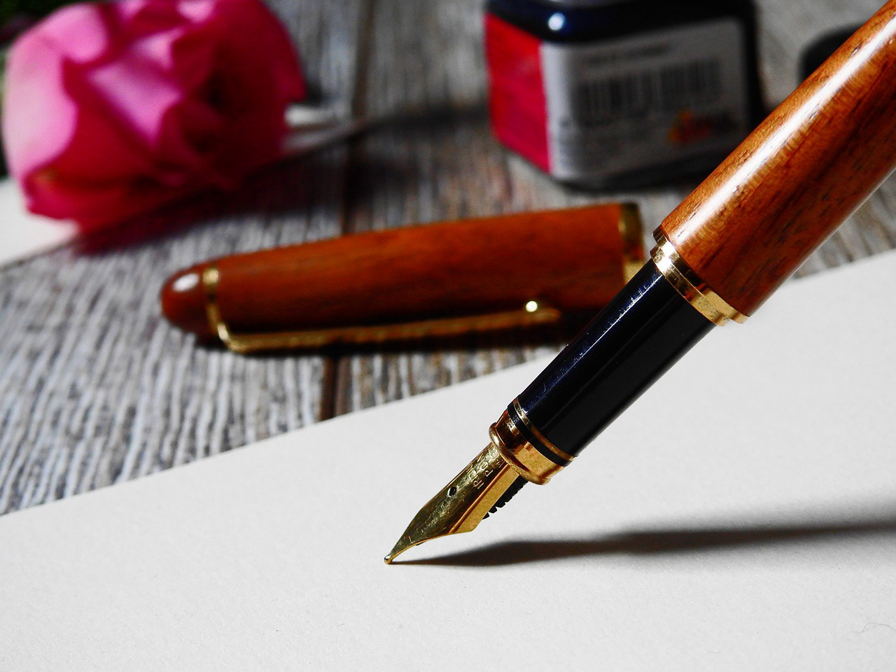 A beautiful fountain pen poised to begin writing