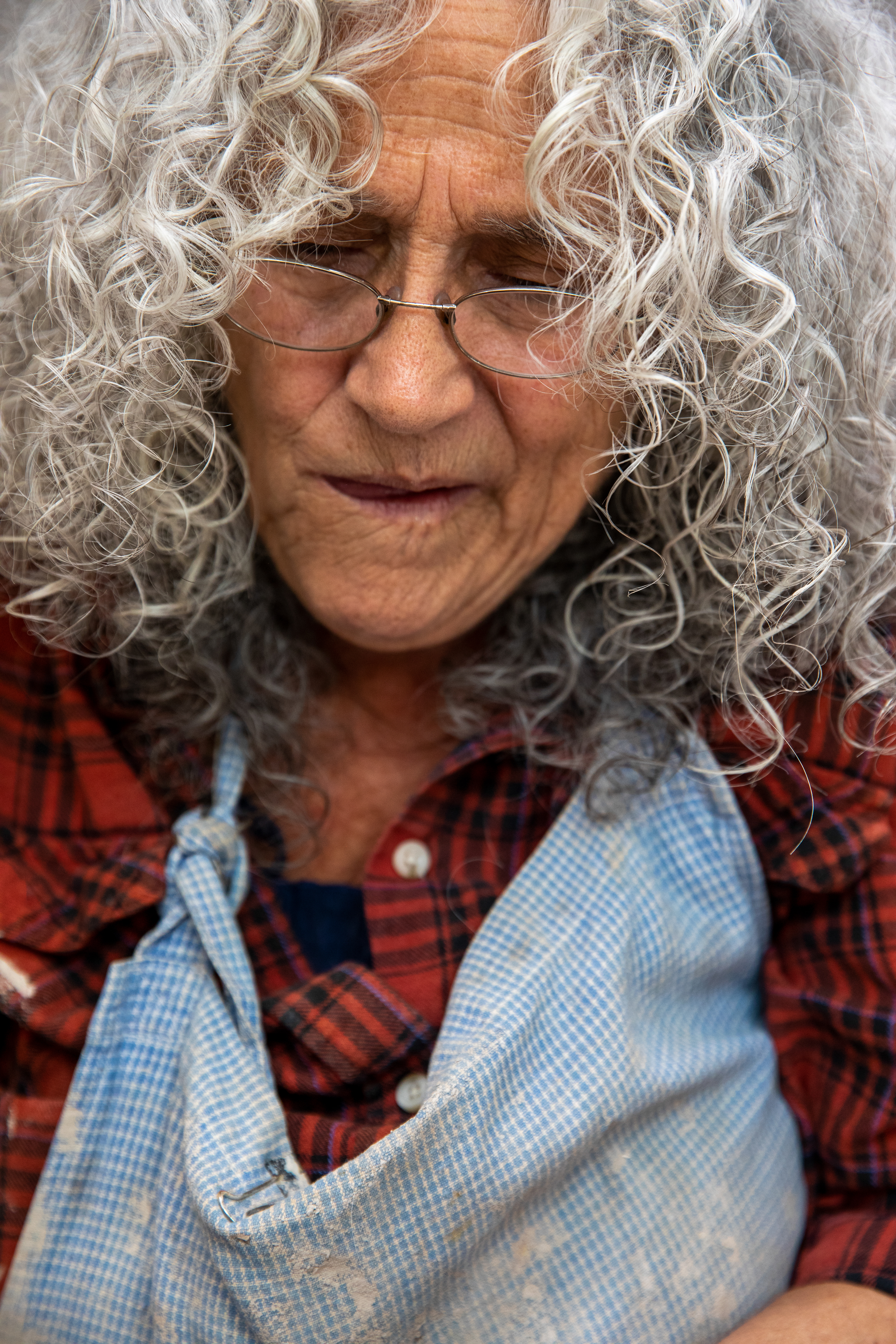 Susan Abramovitz’s face in concentration as she throws a bowl at her studio at Rock Riffle Run Pottery on October 22, 2022.