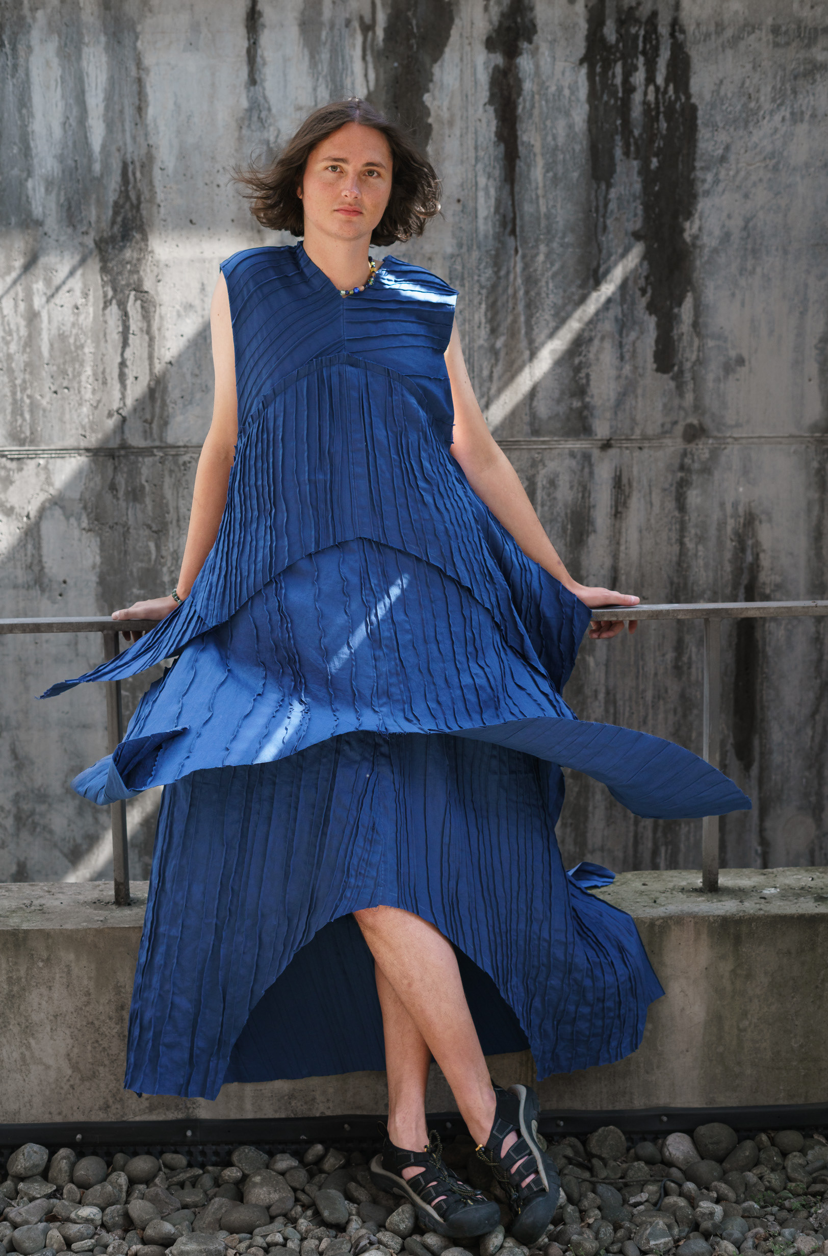 Foot-long dress in hand-dyed cotton satin with layered construction and pintuck detailing.