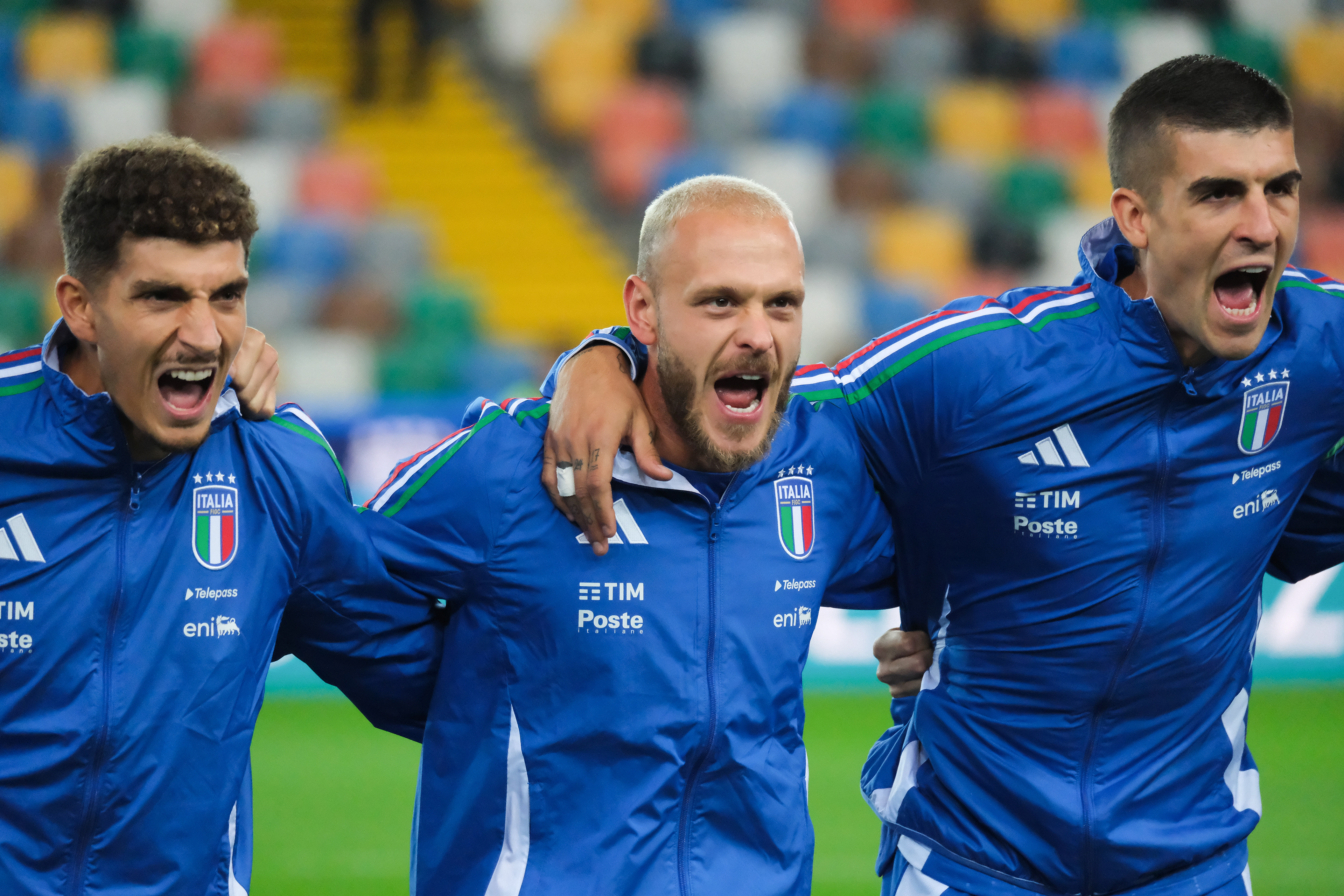ITALY FC v ISRAEL - FIFA World CUP 2026 - Qualification Round // UDINE, ITALY - OCTOBER 14: Giovanni Di Lorenzo (s), Federico Di Marco (c) and Gianluca Mancini (r) singing anthem before the match between Italy and Israel at Stadio Friuli on october 14, 2025 in Udine, Italy. (Photo by Federico Serra)